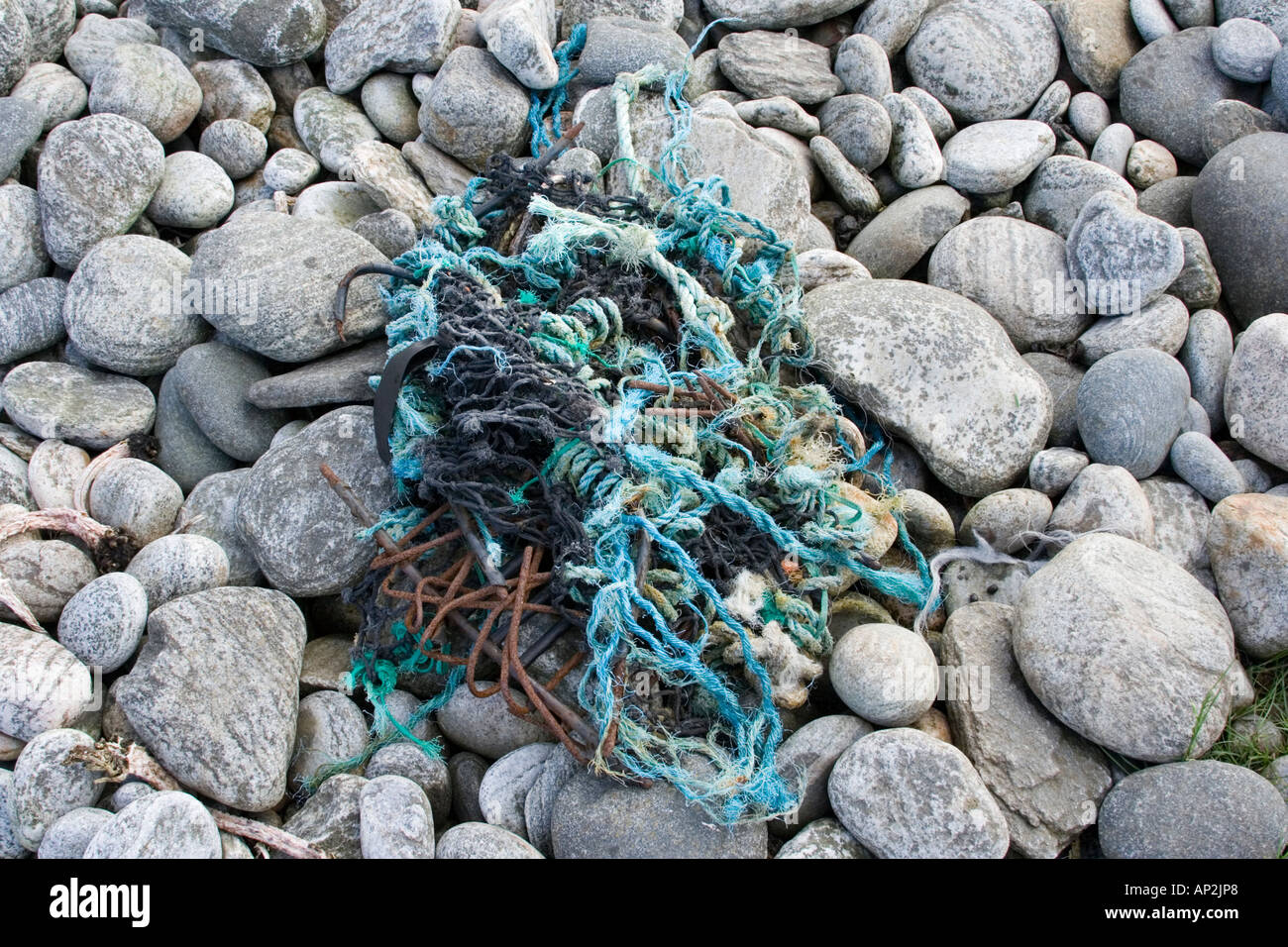 Washed Up Rope Rope washed up on a pebble beech Stock Photo - Alamy