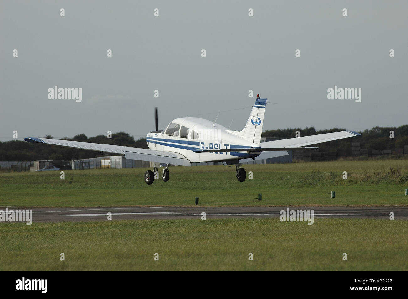 A small light aircraft comes in to land at a private airfield in Lincolnshire Stock Photo