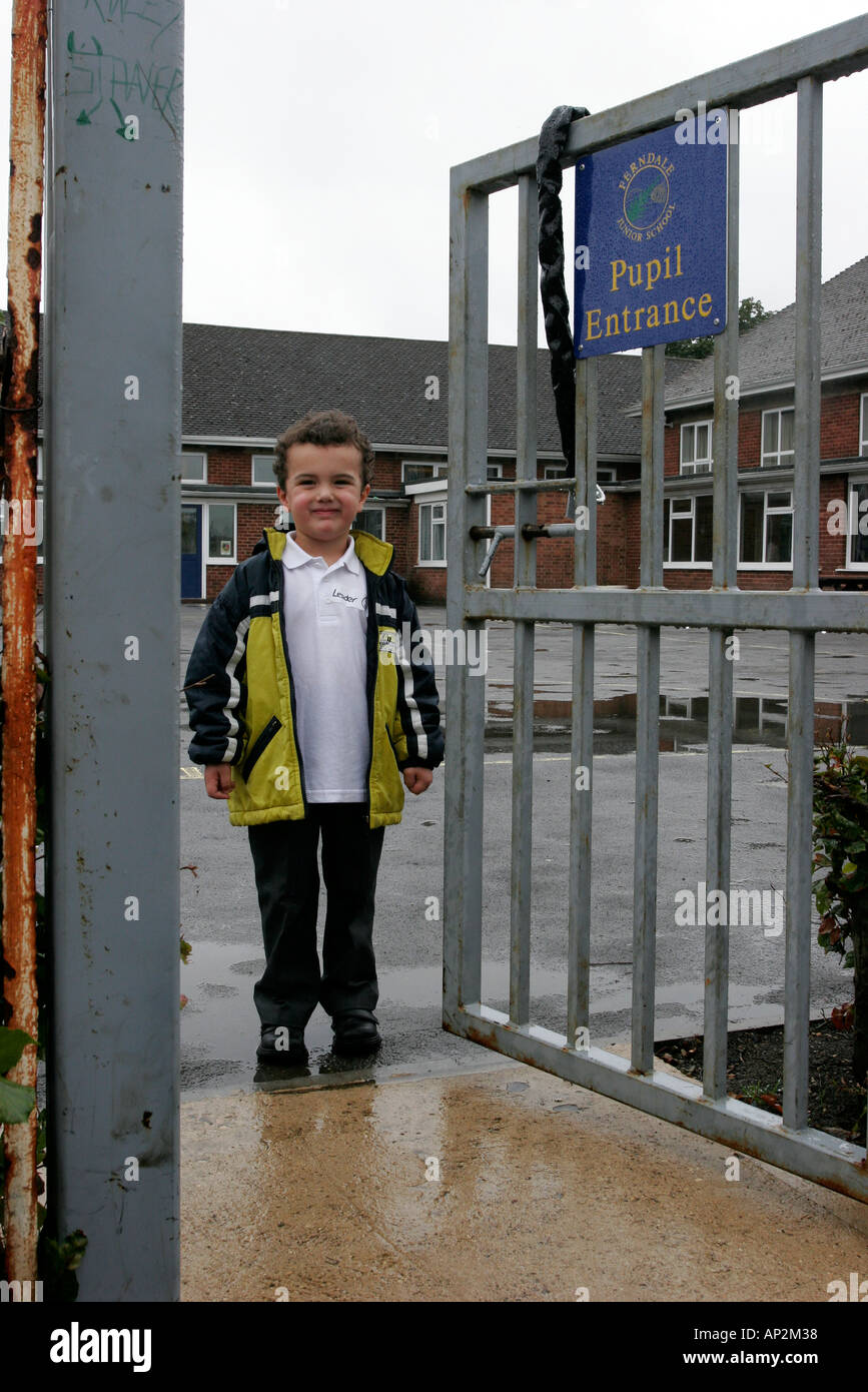 First day at infants school on a cold rainy day September term Stock Photo