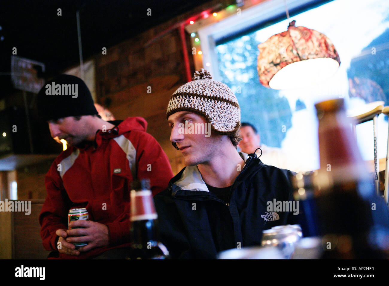 Skiers drinking beer in a pub, T-Bar, Apres Ski, Castle Mountain Ski Resort, Southern Alberta, Canada Stock Photo