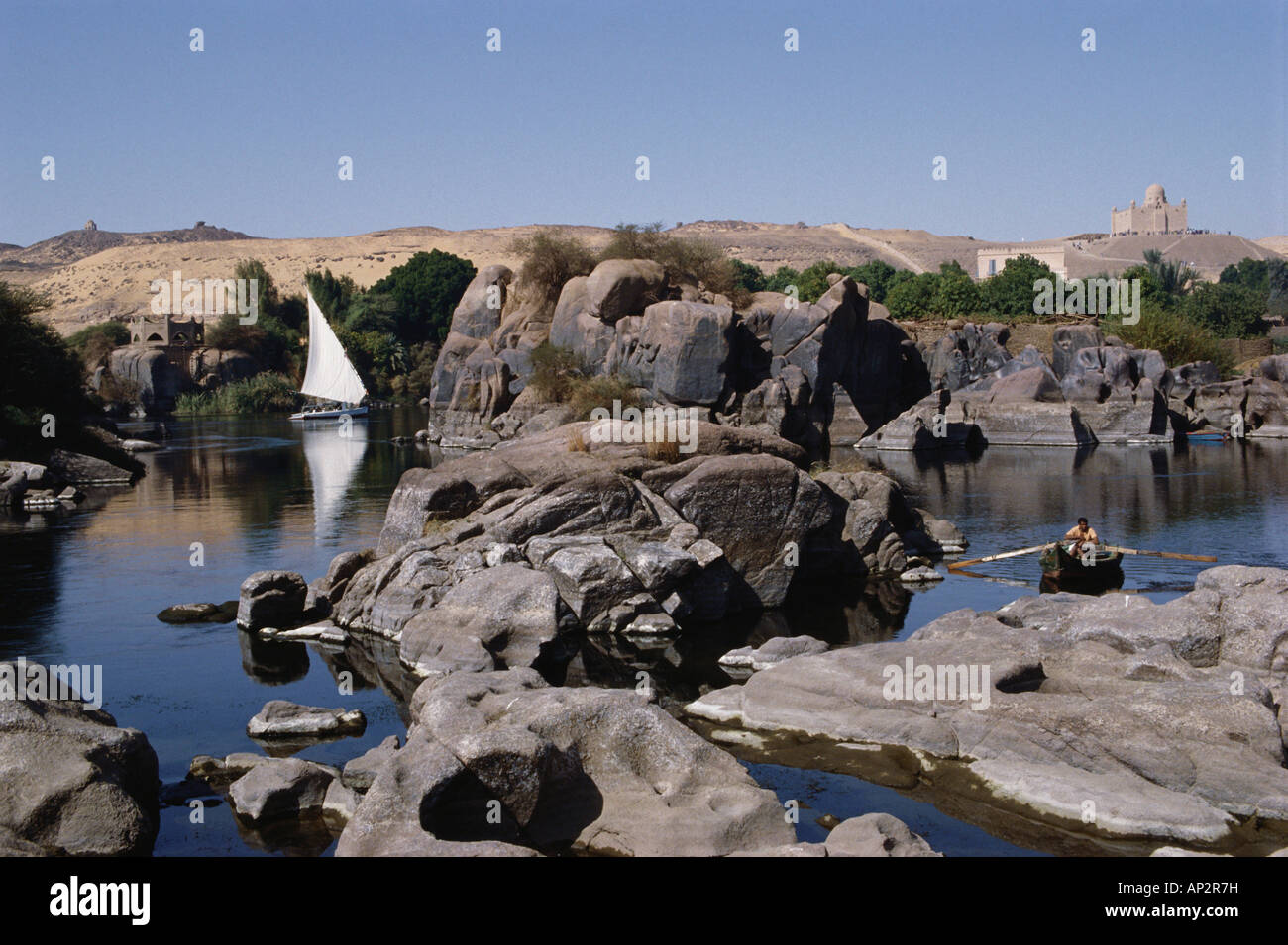 A felucca on the Nile, Aswan, Cataract landscape, Egypt, Africa Stock