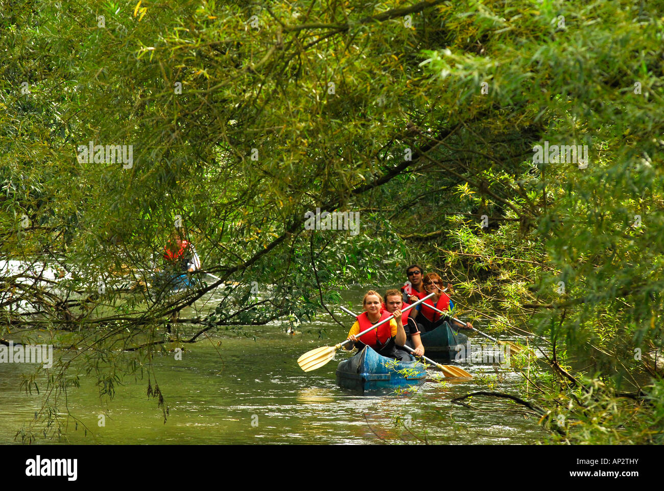People in a canoe on the Werra river near Breitungen, Thuringia, Germany Stock Photo