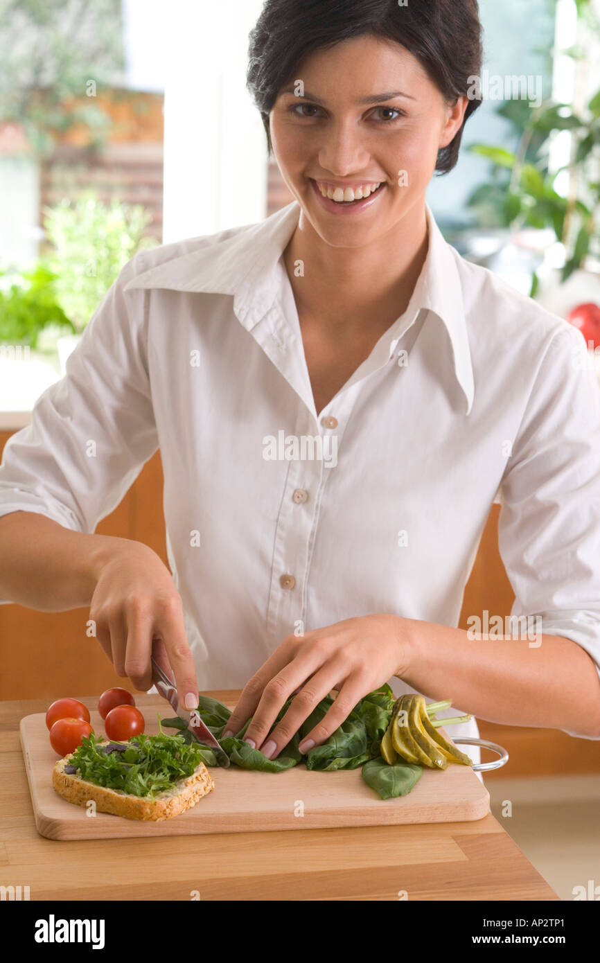 woman making a sandwich Stock Photo