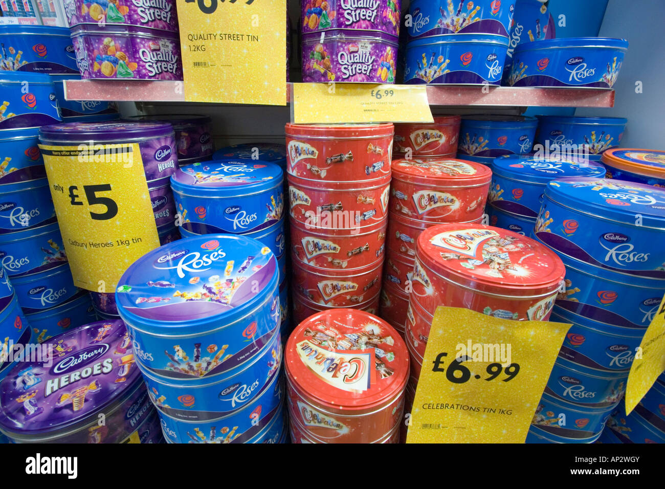 Tins of assorted chocolates for sale in a supermarket Stock Photo