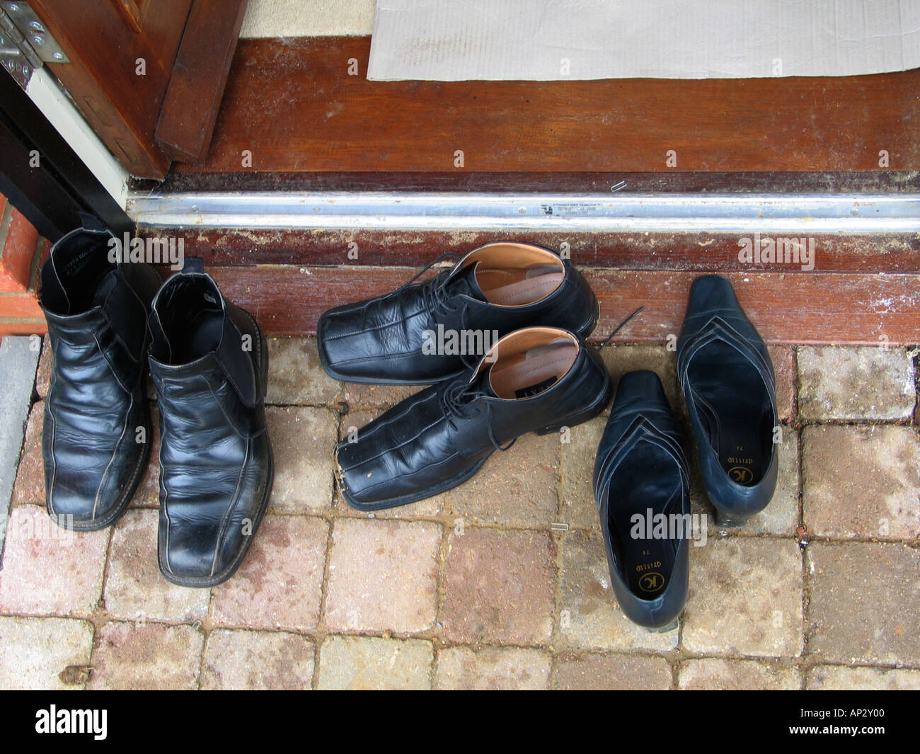 Shoes Outside Front Door High Resolution Stock Photography and Images -  Alamy