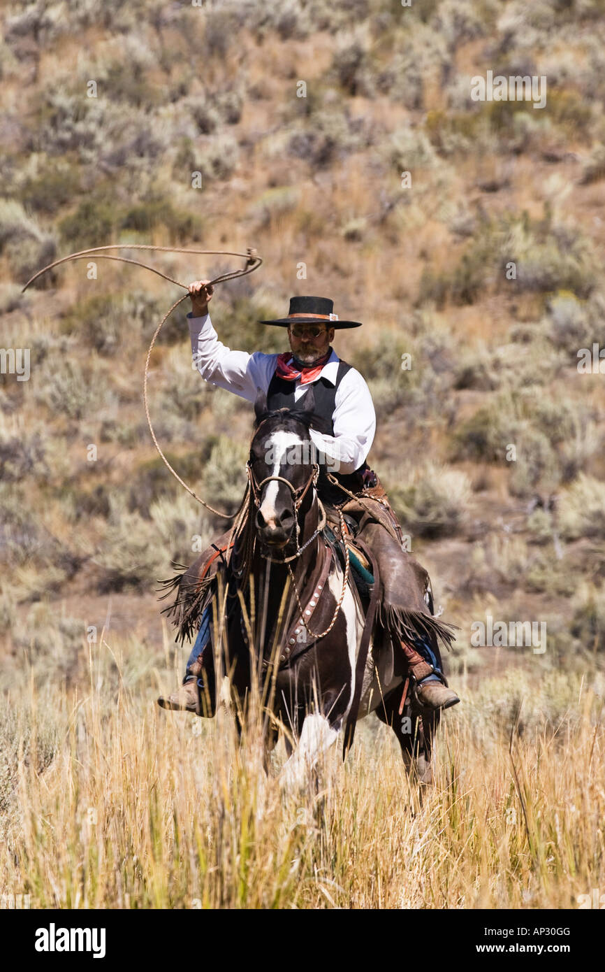 Cowboy throwing lasso wildwest, Oregon, USA Stock Photo