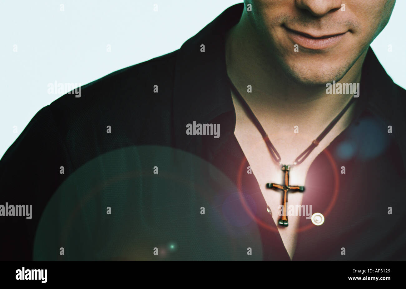 man wearing cross Stock Photo Alamy