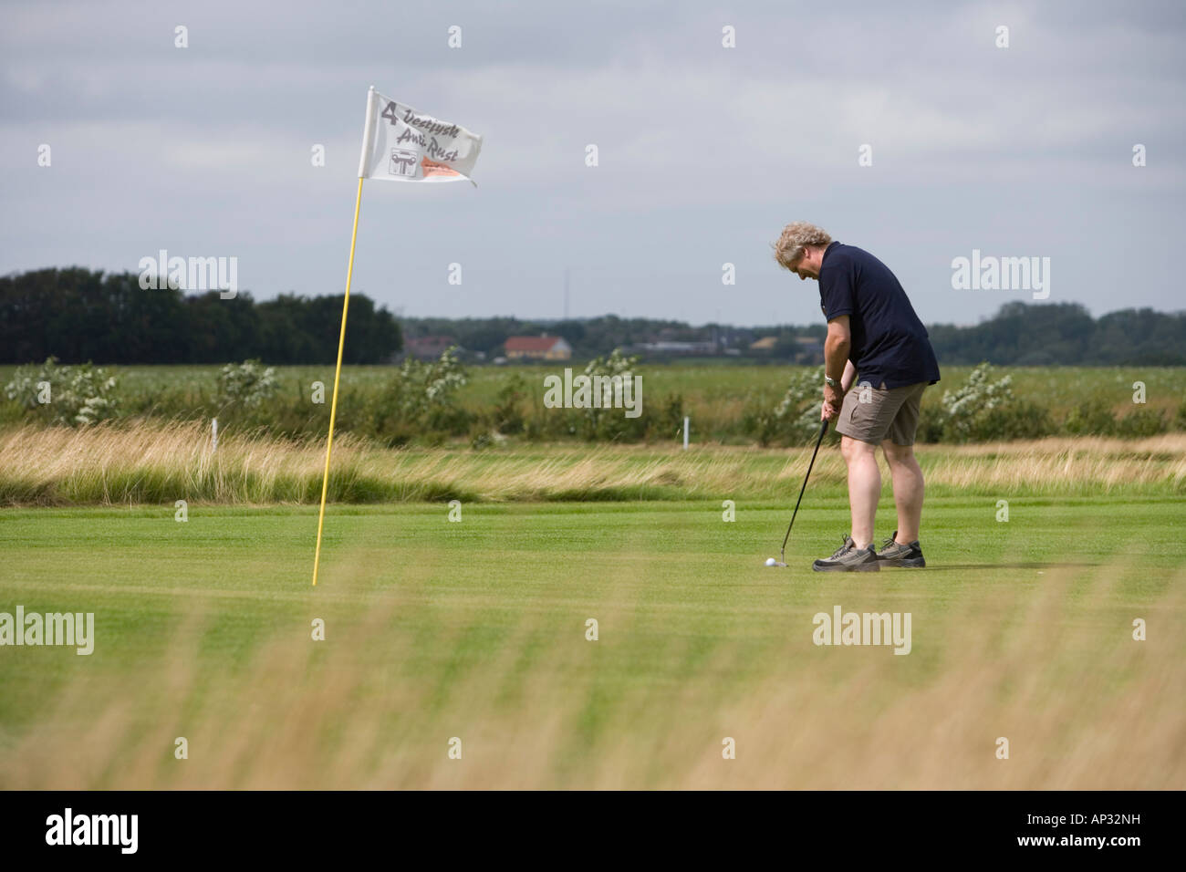 Man on Putting Green, Outrup Golfbane Golf Course, near Varde, Central  Jutland, Denmark Stock Photo - Alamy