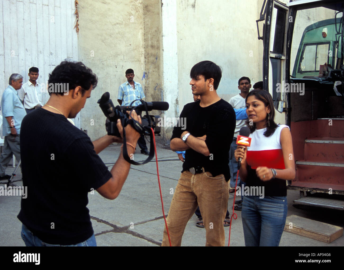 Vivek Oberoi being interviewed during a break in filming for 'Masti', Mumbai, South India Stock Photo