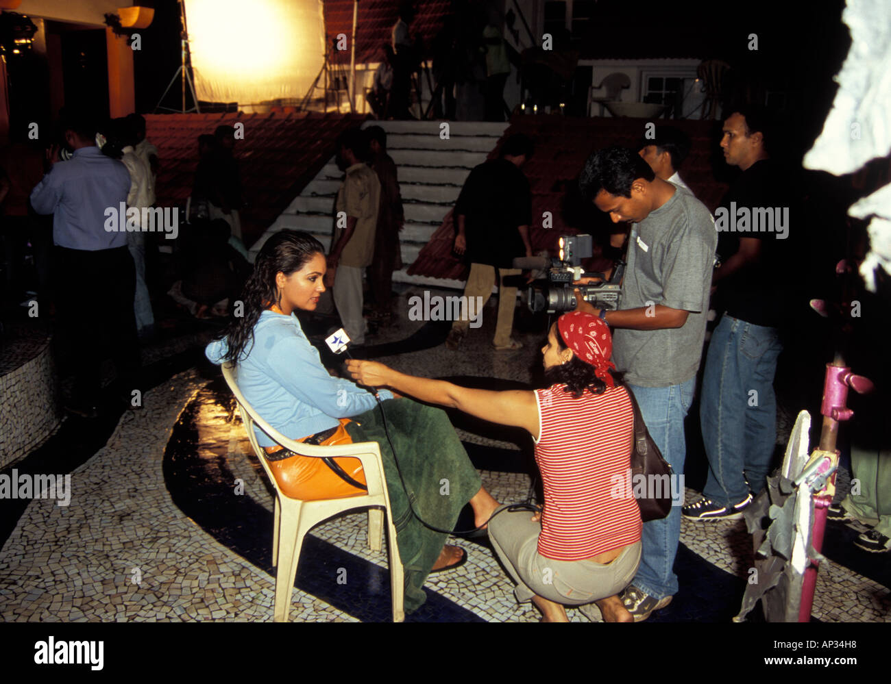 Indian actress Lara Dutta being interviewed during a break in filming for Bollywood film 'Masti', Mumbai, South India Stock Photo