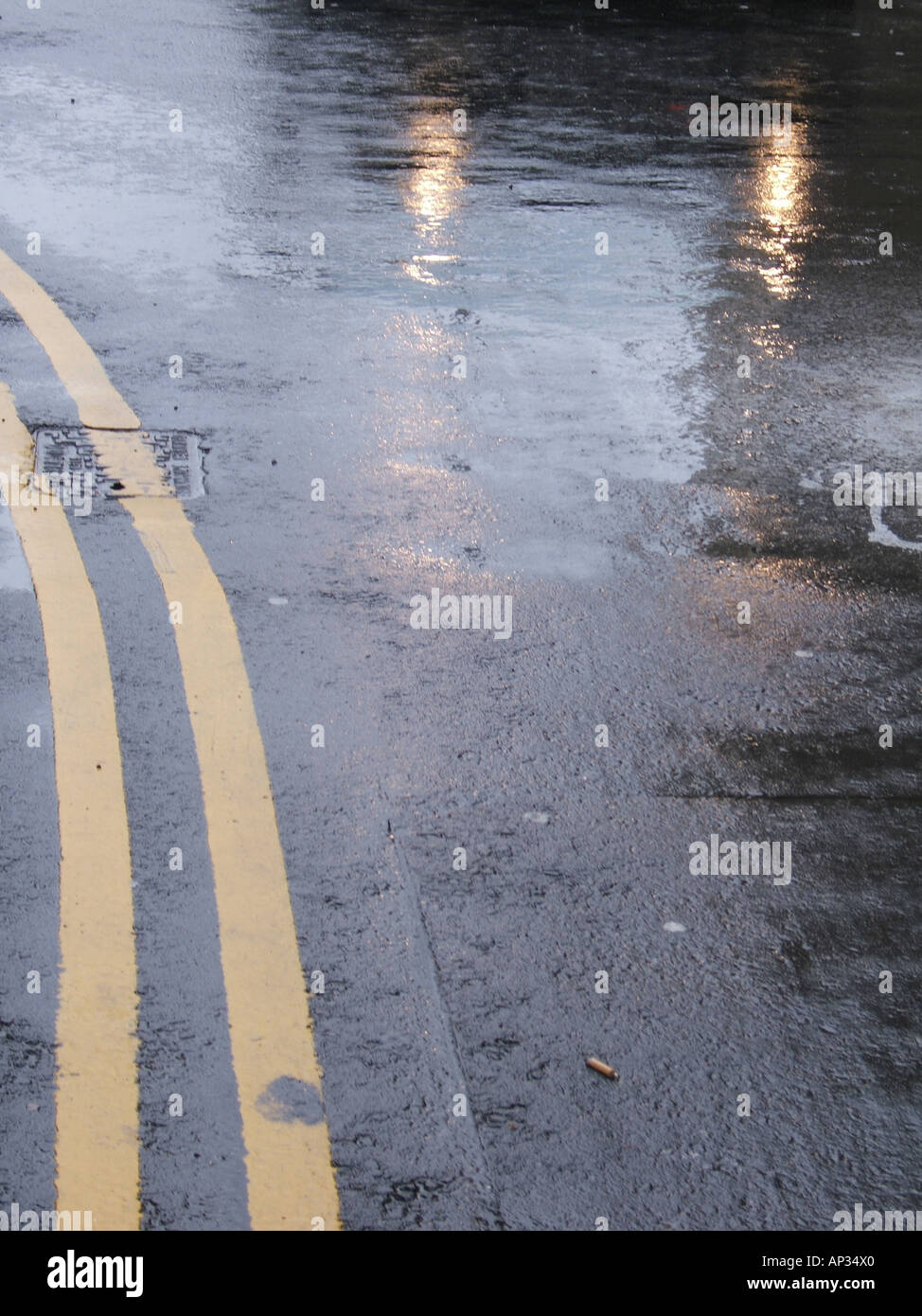 wet road in rain Stock Photo