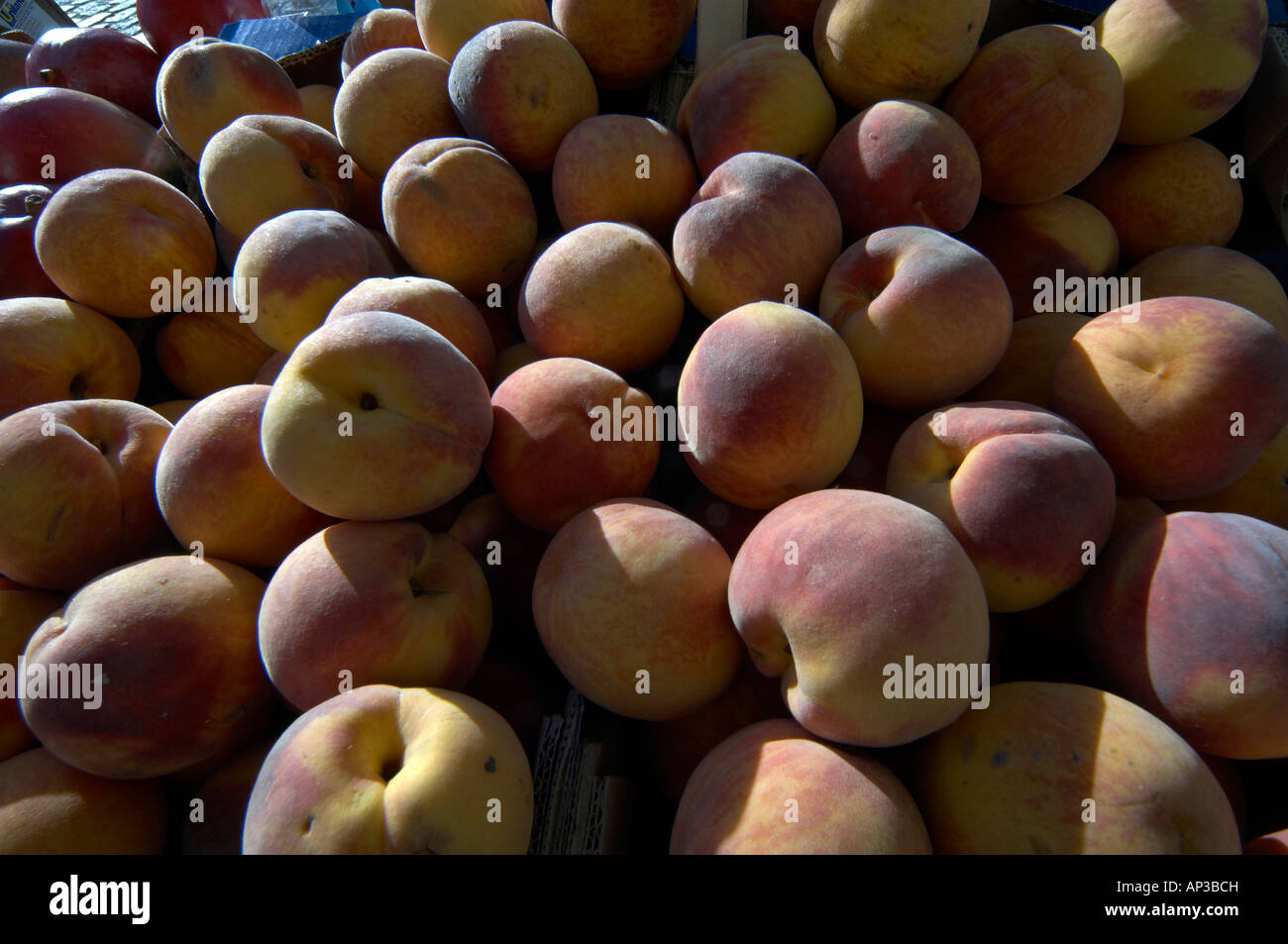 Peaches for sale on a British market stall Stock Photo Alamy
