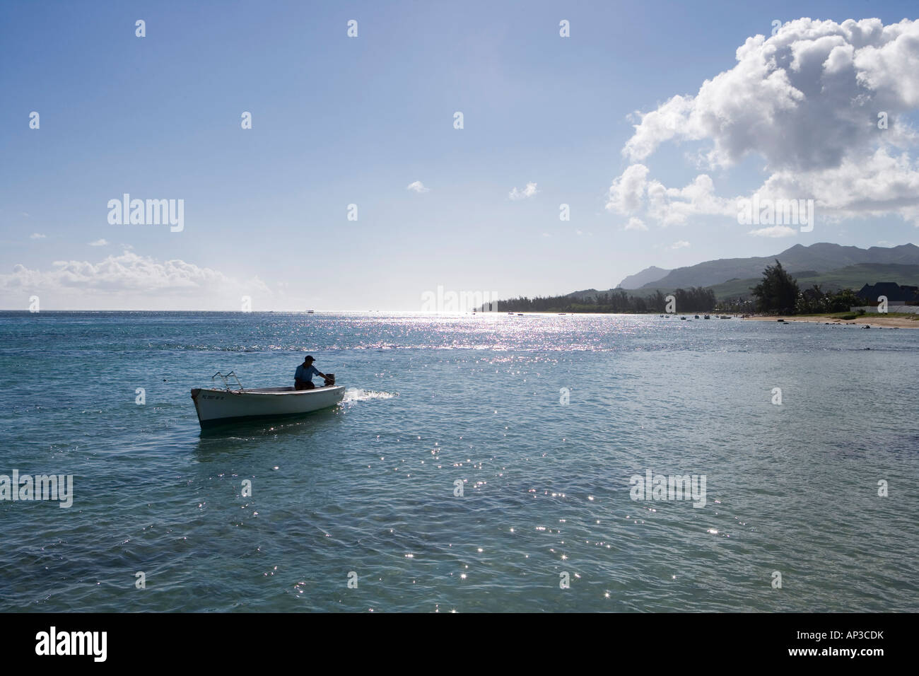 Fishing Boat and Coastline, Bel Ombre, Savanne District, Mauritius Stock Photo