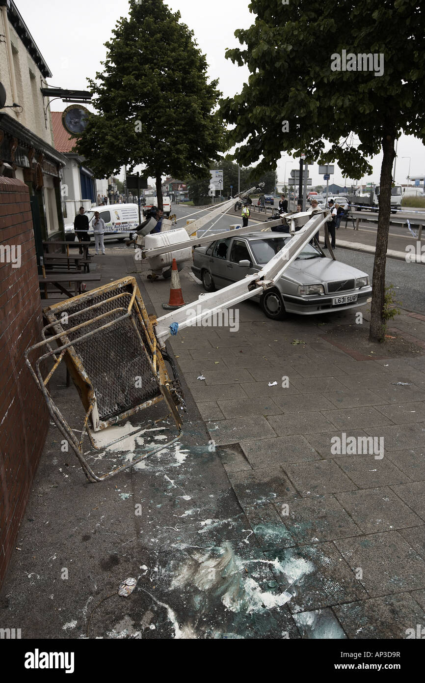 The cherry picker crane that collapsed onto a car outside the