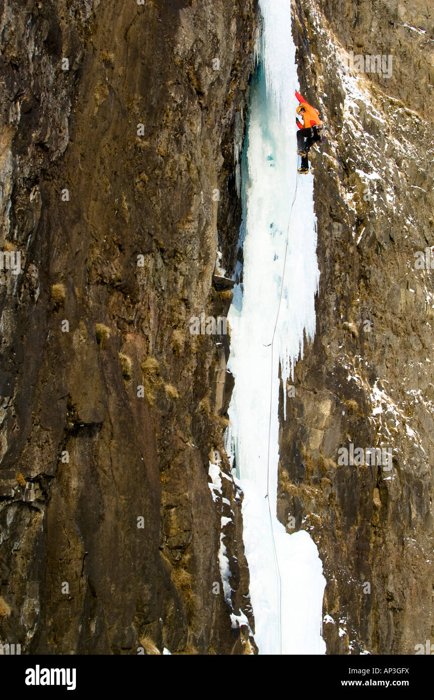 Ice climber on icefall, Iceland Stock Photo