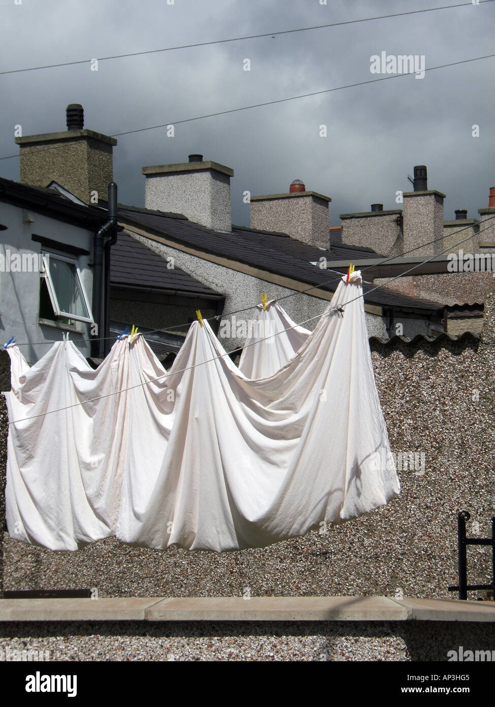 clean bedding sheets hanging on washing line stock photo 8950724 hanging sheets