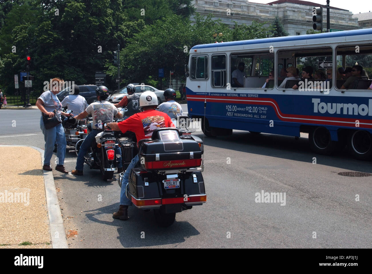 Tourmobile Sightseeing Bus and Motorbikes Near Independence Avenue in Washington DC United States America Stock Photo