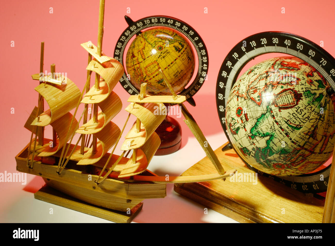 Model Ship and Antique Globes Stock Photo - Alamy