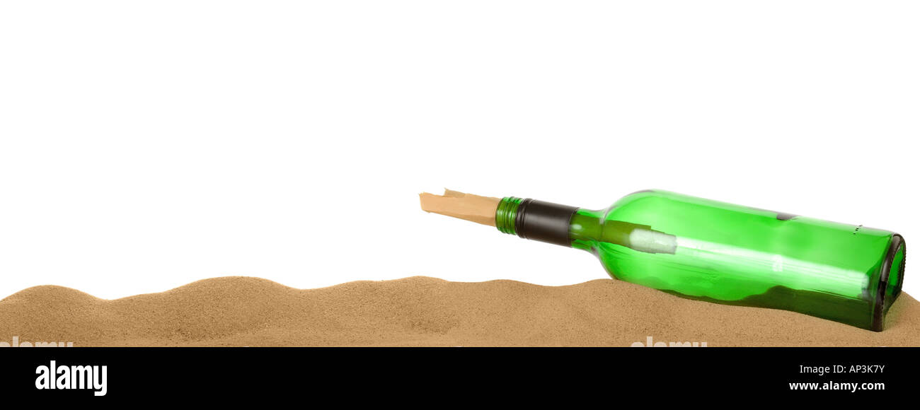 Message in a bottle on a sand border Stock Photo