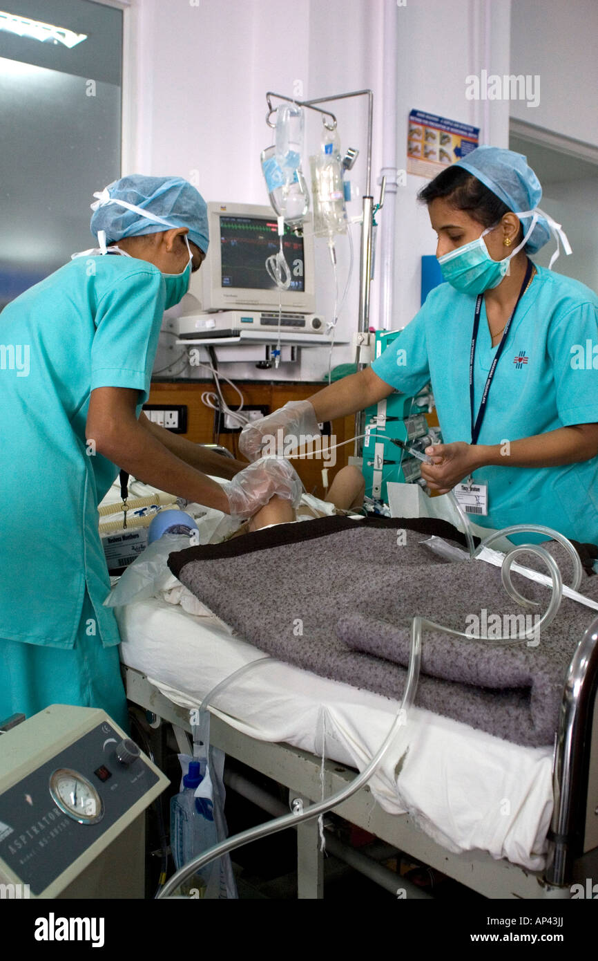 Nurses work in the Pediatric Intensive Care Unit (PICU) of the Narayana Hrudayalaya hospital in Bangalore, India. Stock Photo