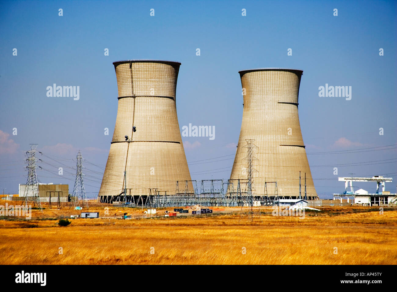 Nuclear power plant cooling towers in rural area near Sacramento California Stock Photo