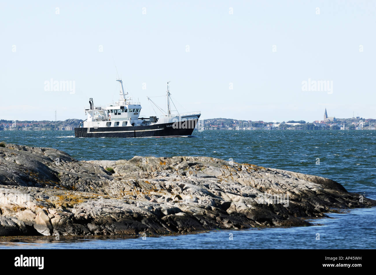 Fishing boat on water in Sweden Stock Photo