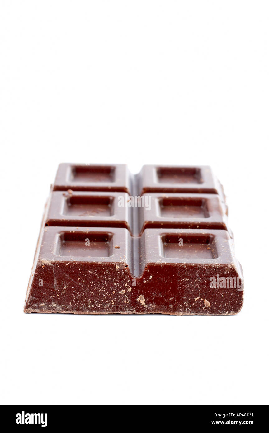 Block of fine chocolate on white background Shallow DOF Stock Photo
