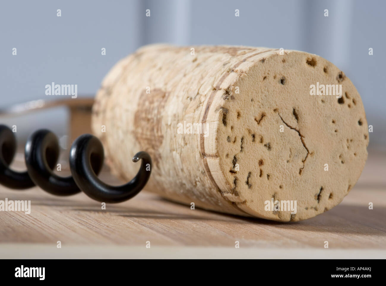A close up of a wine bottle cork and corkscrew Stock Photo