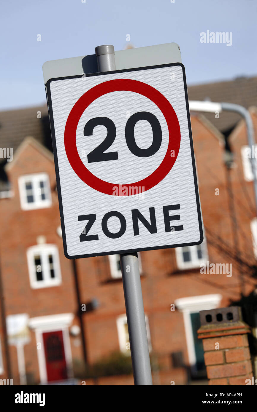 20 MPH Zone Sign in Residential Area Stock Photo