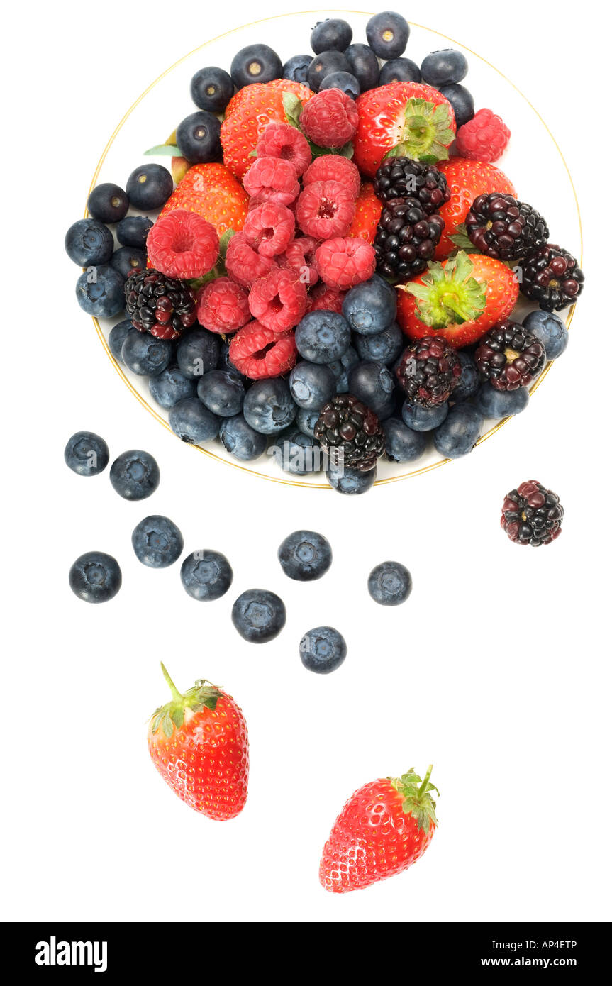 Mixed fruit on a white plate Stock Photo