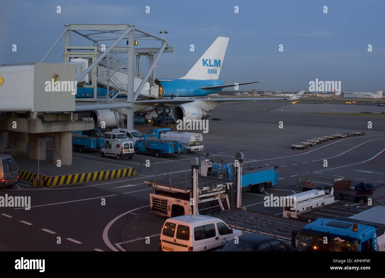 A KLM Cargo configuration Boeing 747 400 is being prepared for its long haul flight at the gate in Amsterdam Shiphol airport Stock Photo