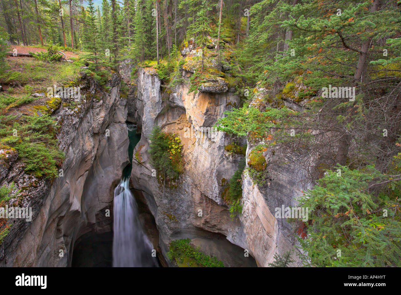 A falls in a narrow and deep canyon in the north of Canada Stock Photo