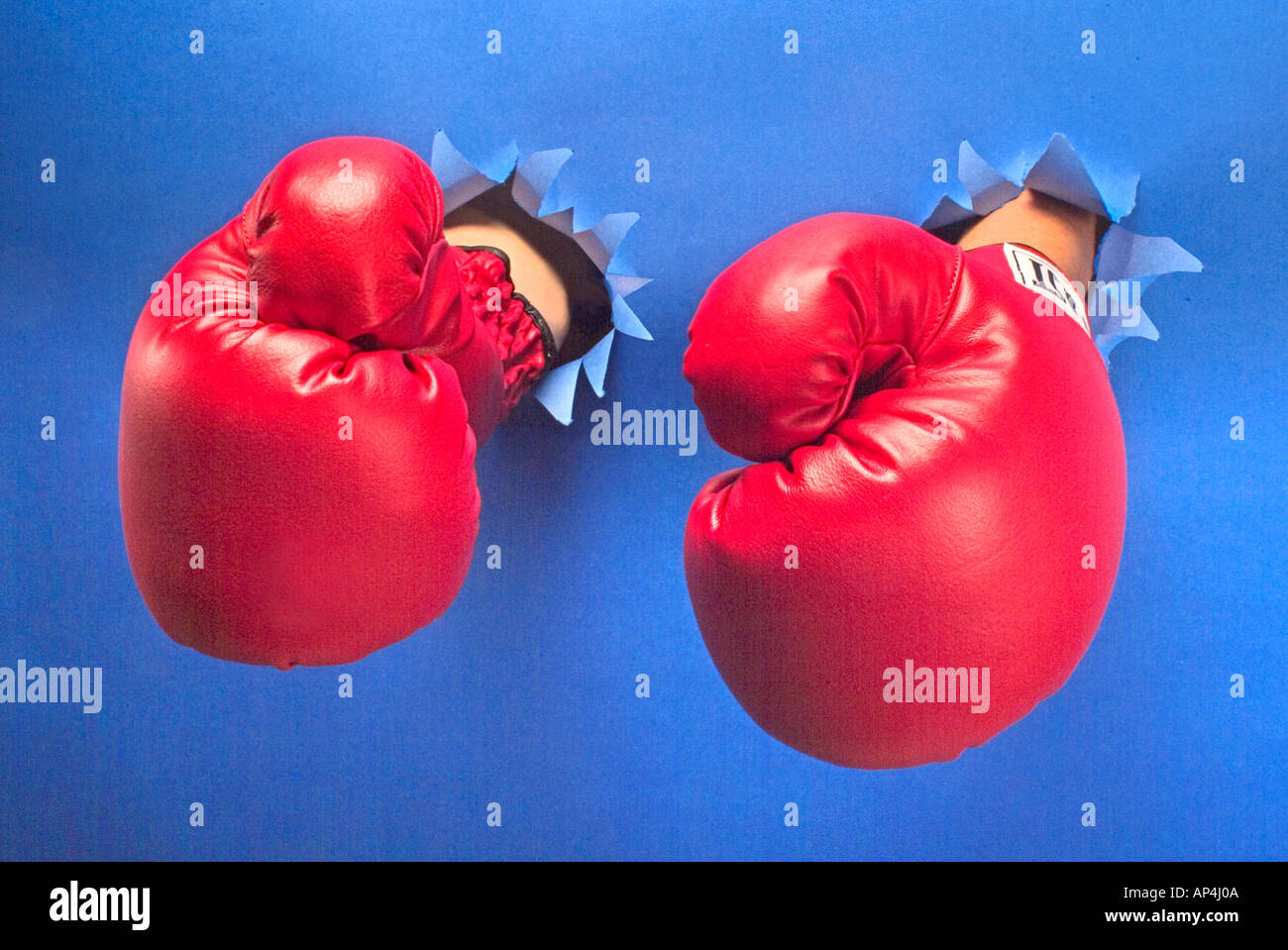 Boxing Gloves Breaking Barrier Stock Photo Alamy
