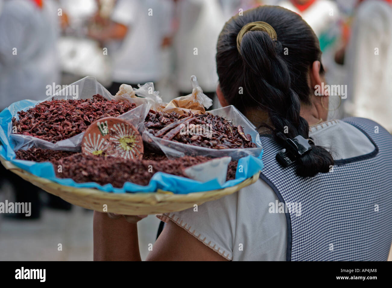 Street vendor offering dried goods on a street of Oaxaca,Mexico Stock
