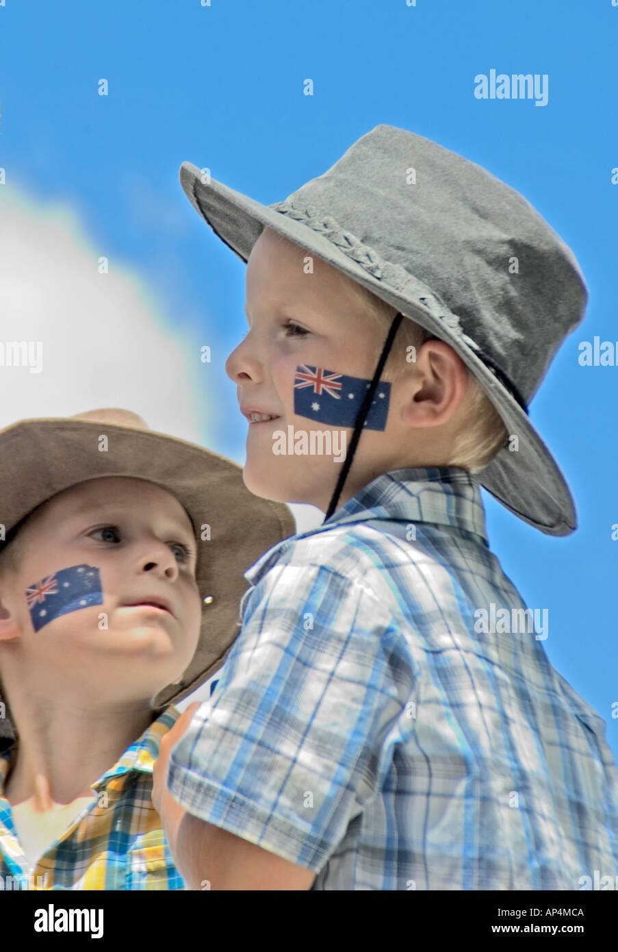 Two Australian kids, with an Aussie flag tatooed on their cheek, celebrating Australia day, Canberra, Australia Stock Photo