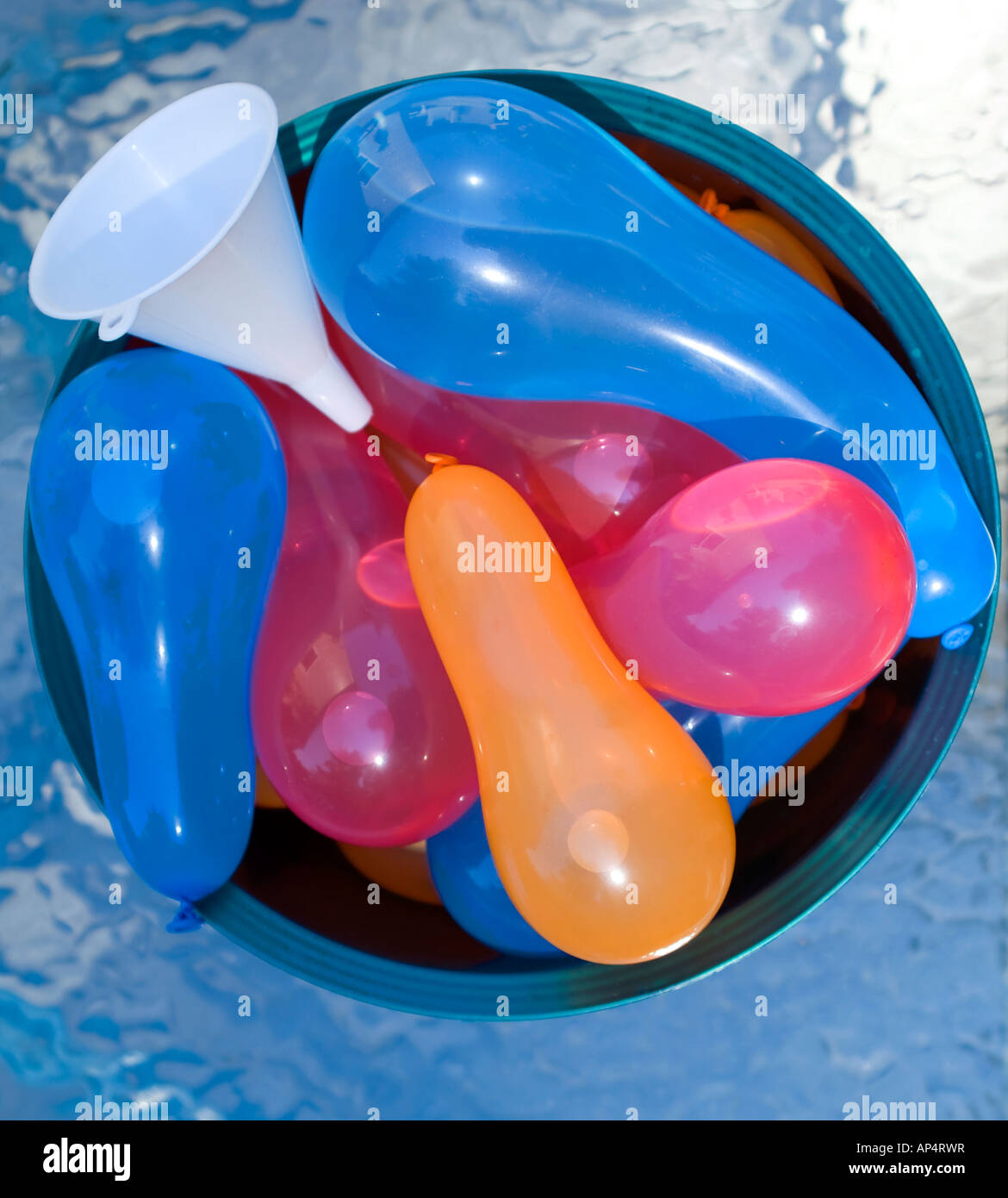 Deck Table with Bowl of Water Balloons and Funnel Stock Photo Alamy