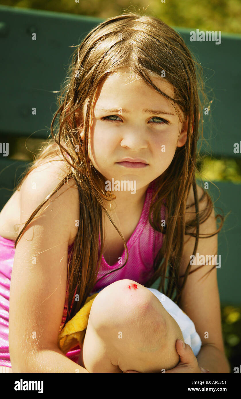 Girl scraped her knee Stock Photo Alamy