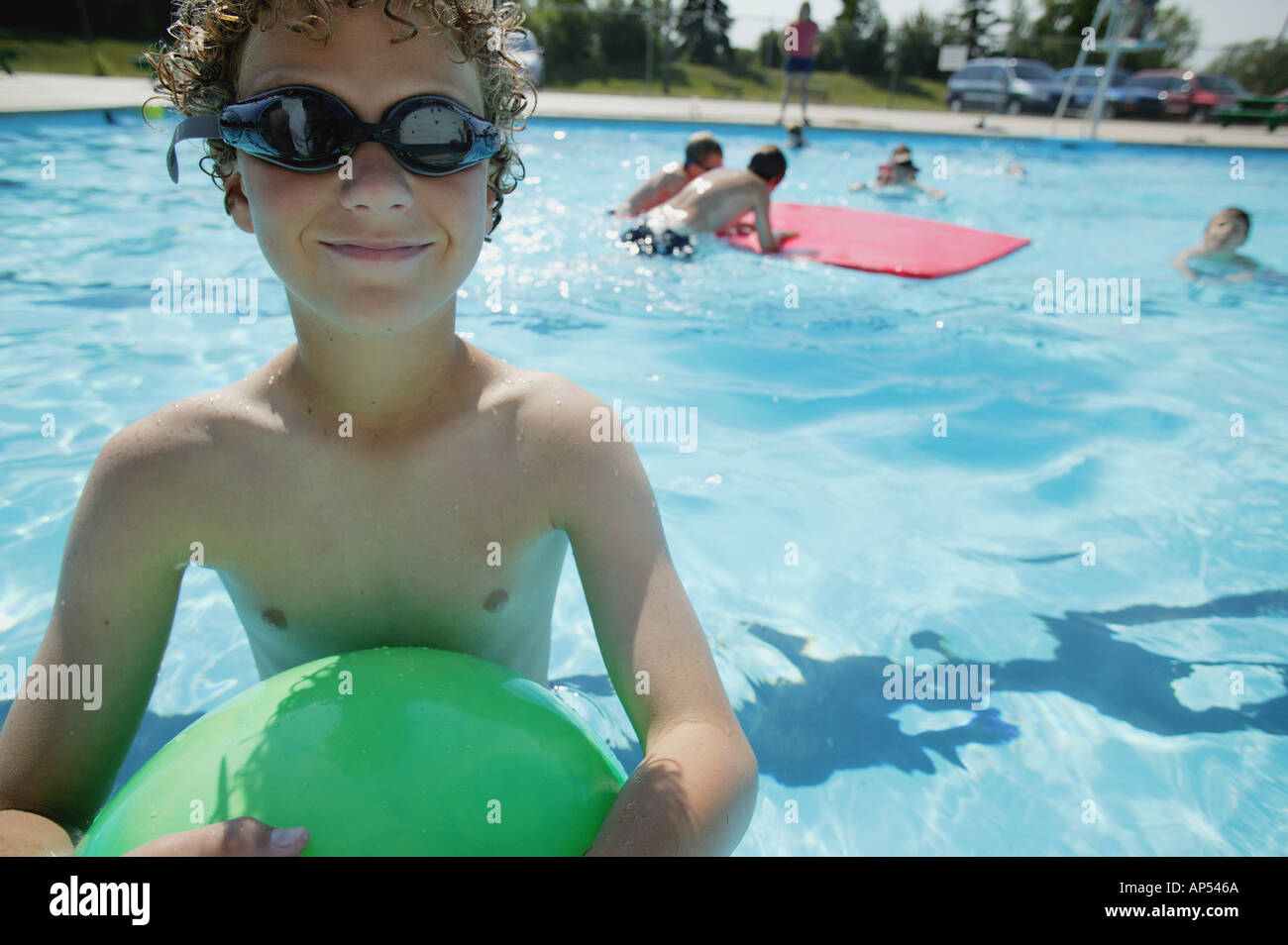 Boy in swimming pool Stock Photo Alamy