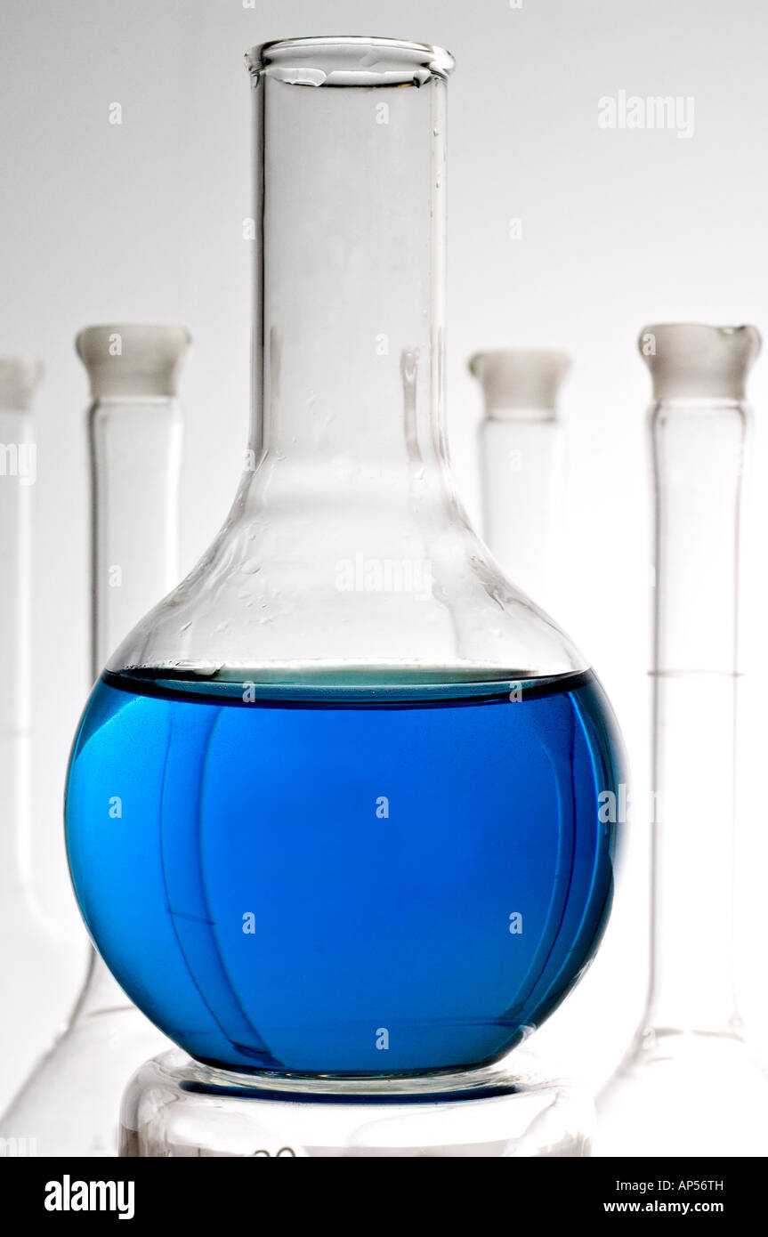 Glass laboratory flasks and columns representing science and research