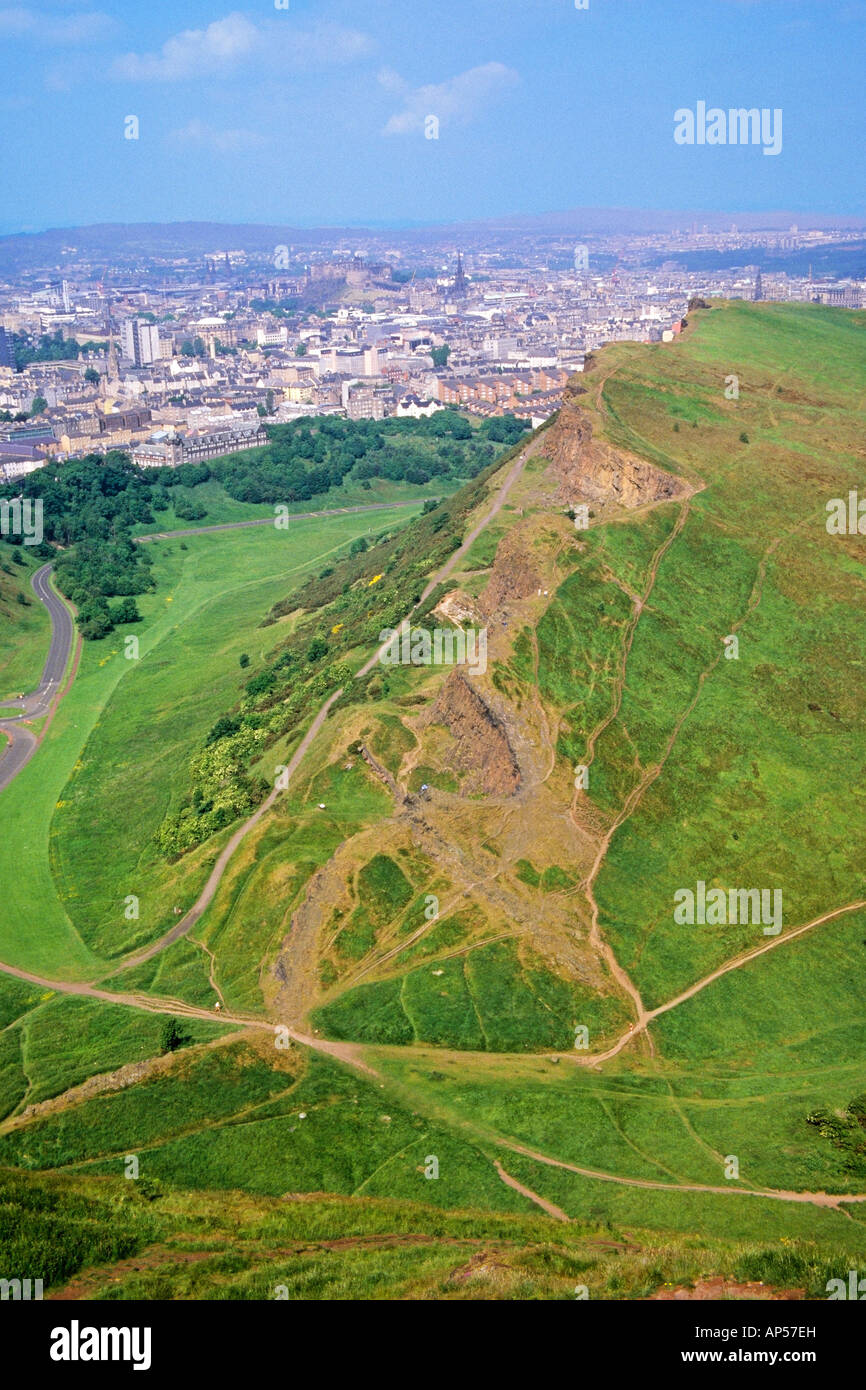Walkers on Salisbury Crags and the Radical Road in Holyrood Park Edinburgh Stock Photo