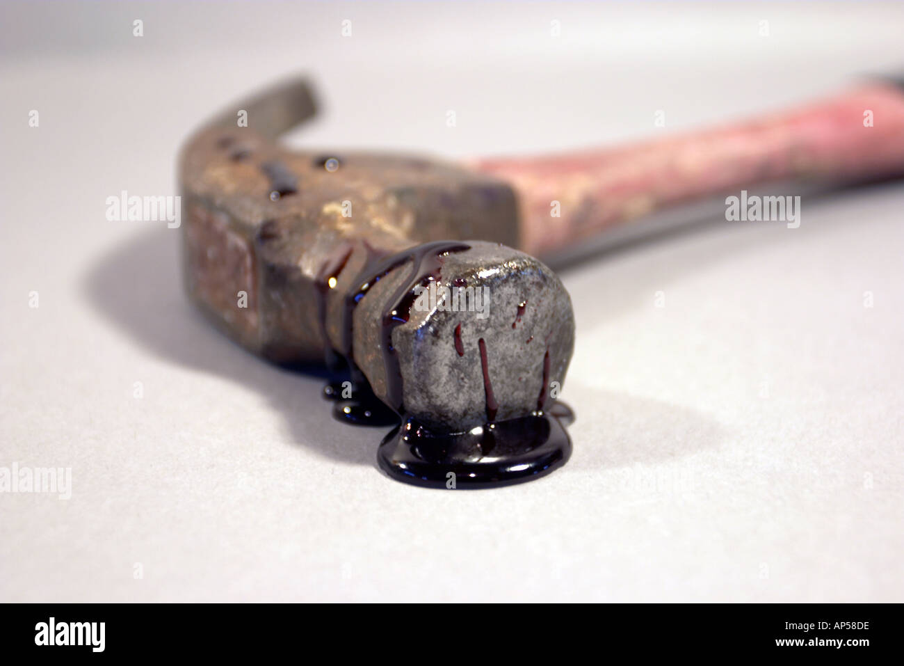Hammer with blood and pieces of flesh and fat tissue along with strands of  human hair. Forensic evidence Stock Photo - Alamy