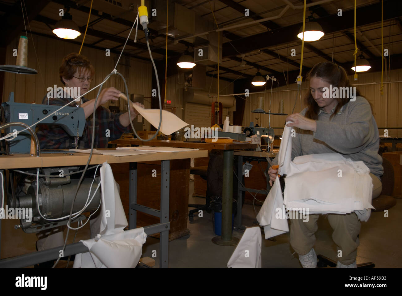 Female inmates sewing Sewing is one of the work programs at the Nebraska Correctional Center for Women  Stock Photo