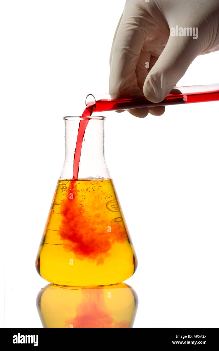 Lab worker mixing chemicals Stock Photo Alamy