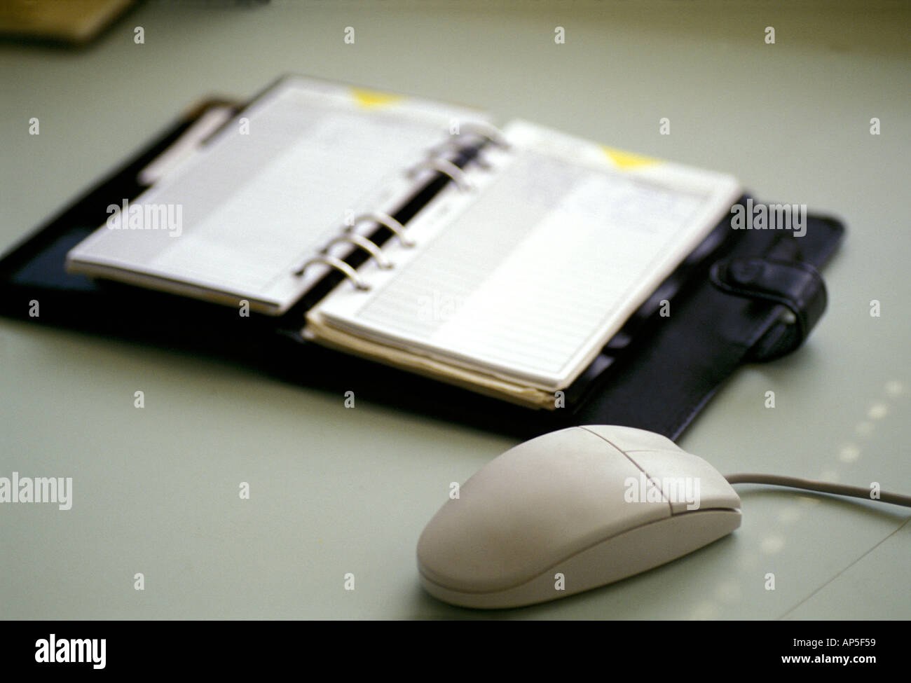 Computer mouse and filofax Stock Photo - Alamy