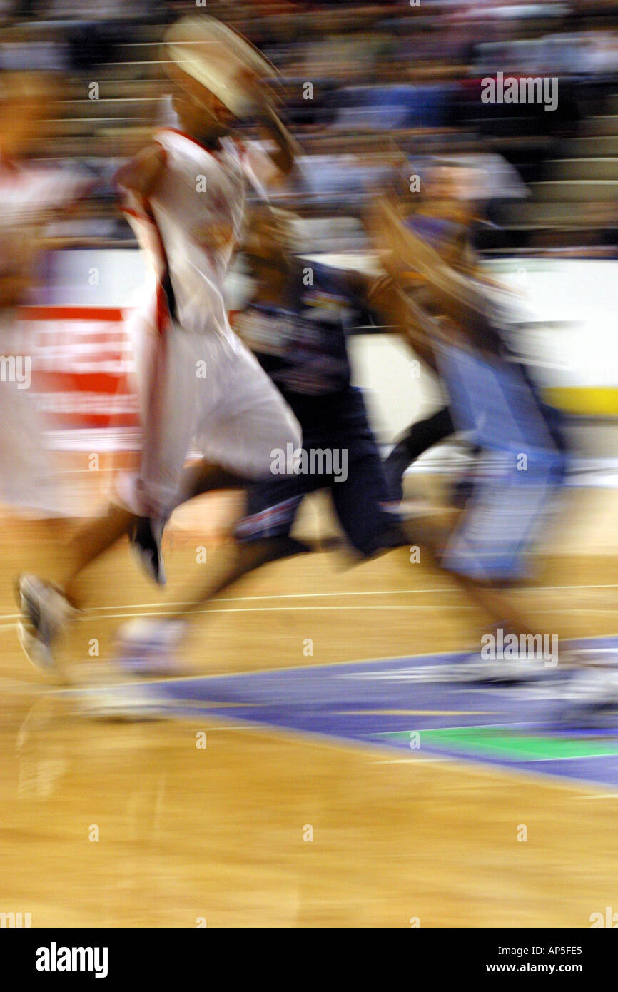 Motion blurred basketball action Stock Photo Alamy