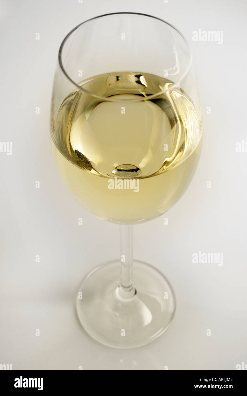 Single Glass Of White Wine, Half Full, White Background Stock Photo Alamy