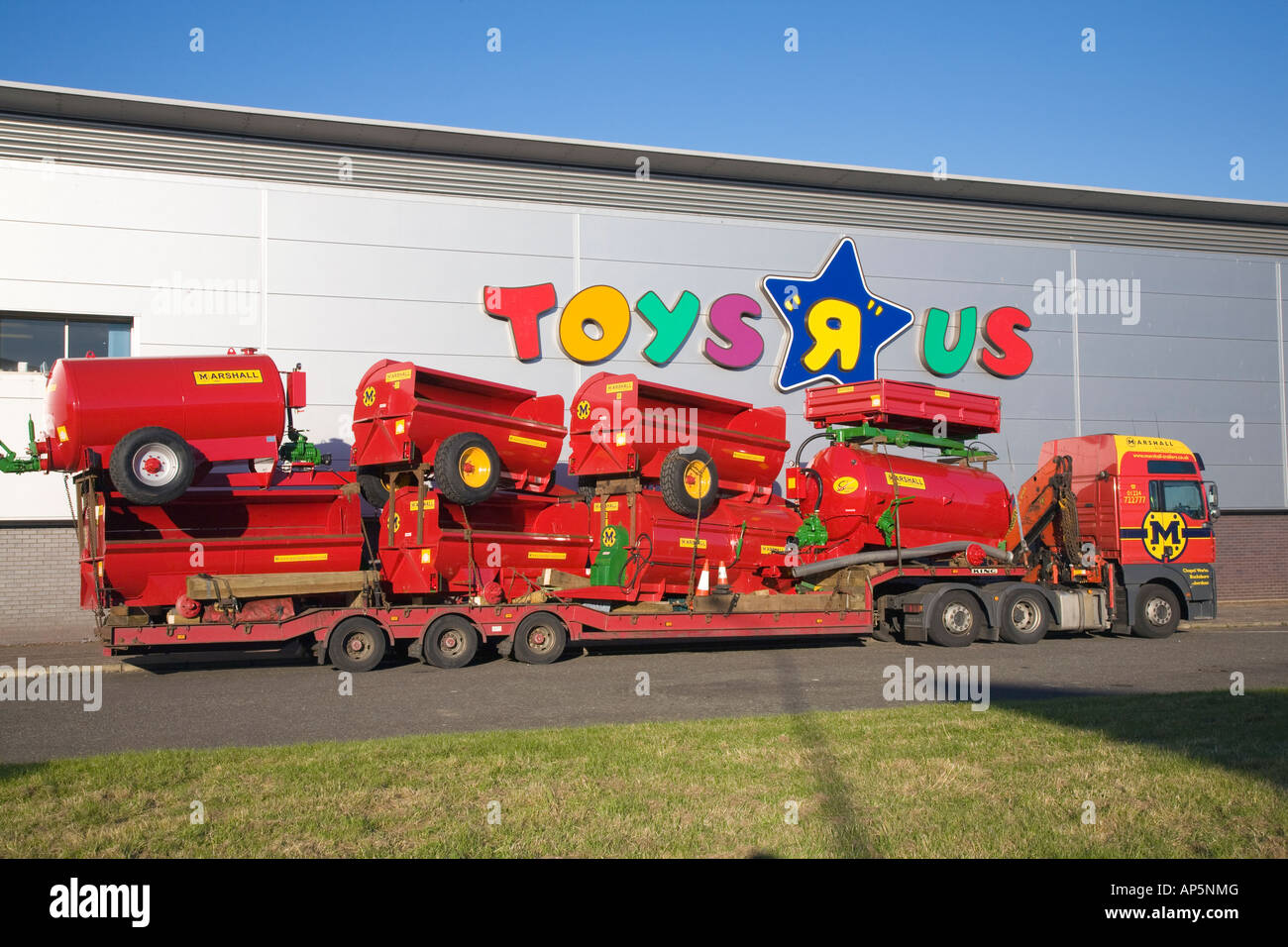 Farm equipment delivery vehicles outside, Toys R Us Dundee city centre  store warehouse, Scotland UK Stock Photo - Alamy