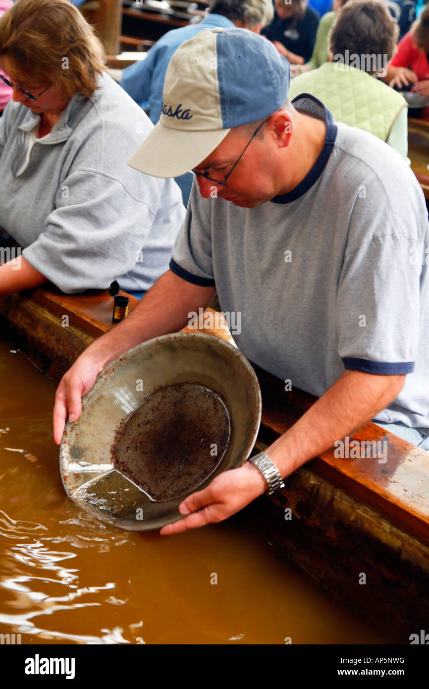 Visitors to Eldorado gold mine in Fairbanks Alaska USA, panning for