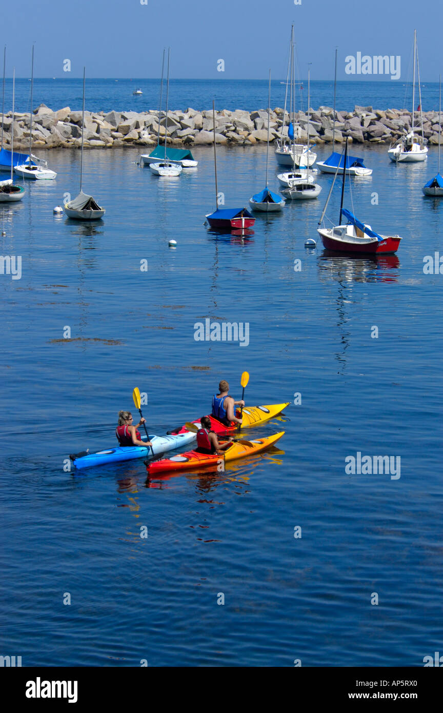 Rockport, Massachusetts, USA, kayakers in harbor along Bearskin Neck