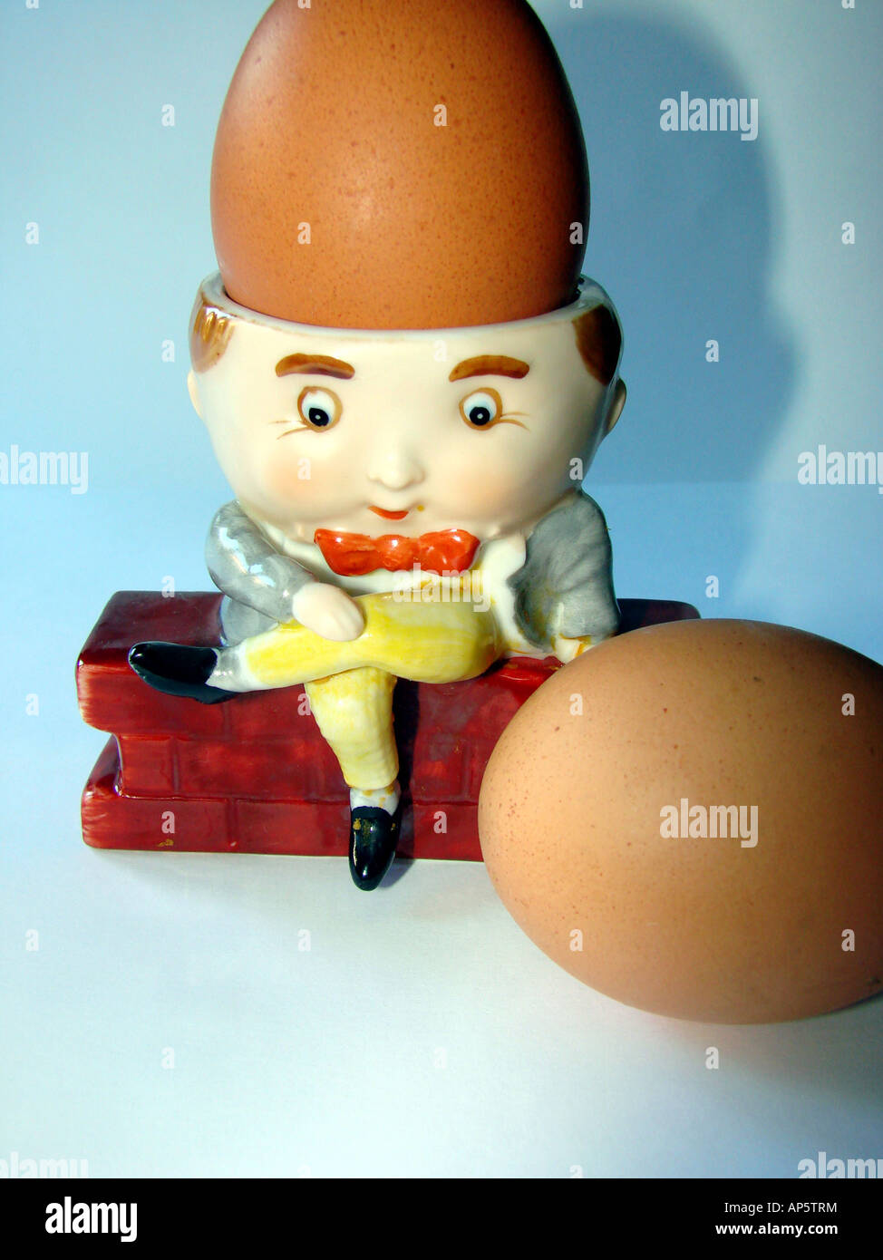 A Humpty Dumpty Egg Cup Holder with 2 Egg's Stock Photo